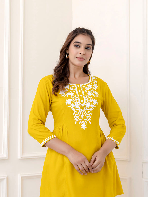 Yellow Rayon Hip Length Solid Round Neck Solid Embroidered Straight Top