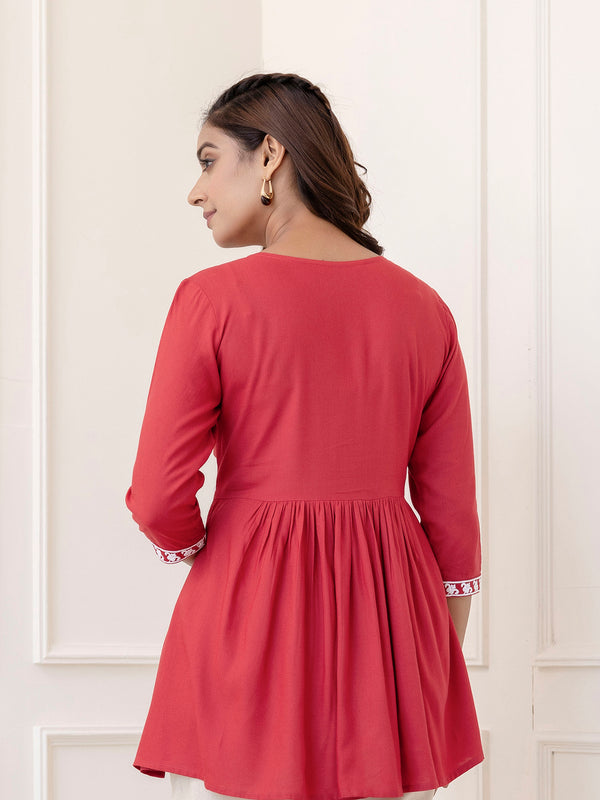 Coral Rayon Hip Length Solid V-Neck Solid Embroidered Semi-Flared Top