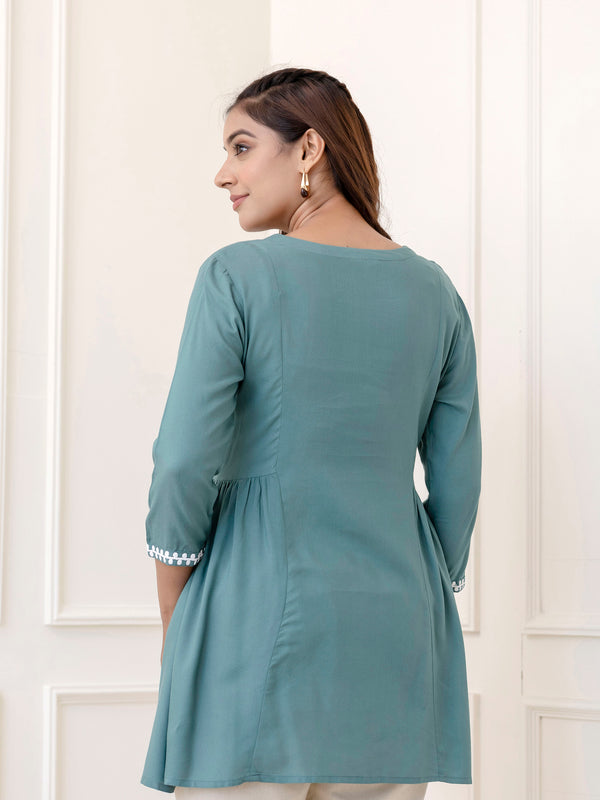 Skyblue Rayon Hip Length Solid Round Neck Solid Embroidered Straight Top