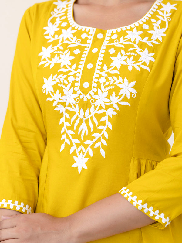 Yellow Rayon Hip Length Solid Round Neck Solid Embroidered Straight Top
